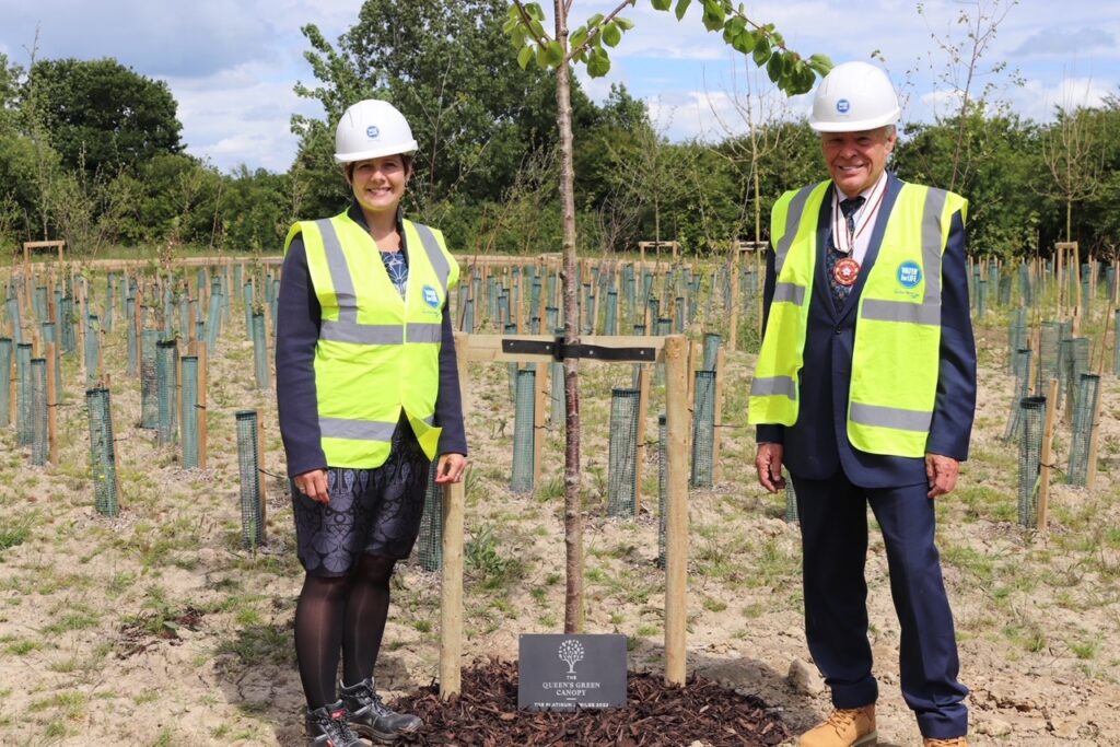 David Allam and Katy Taylor with the newly planted wild cherry tree
