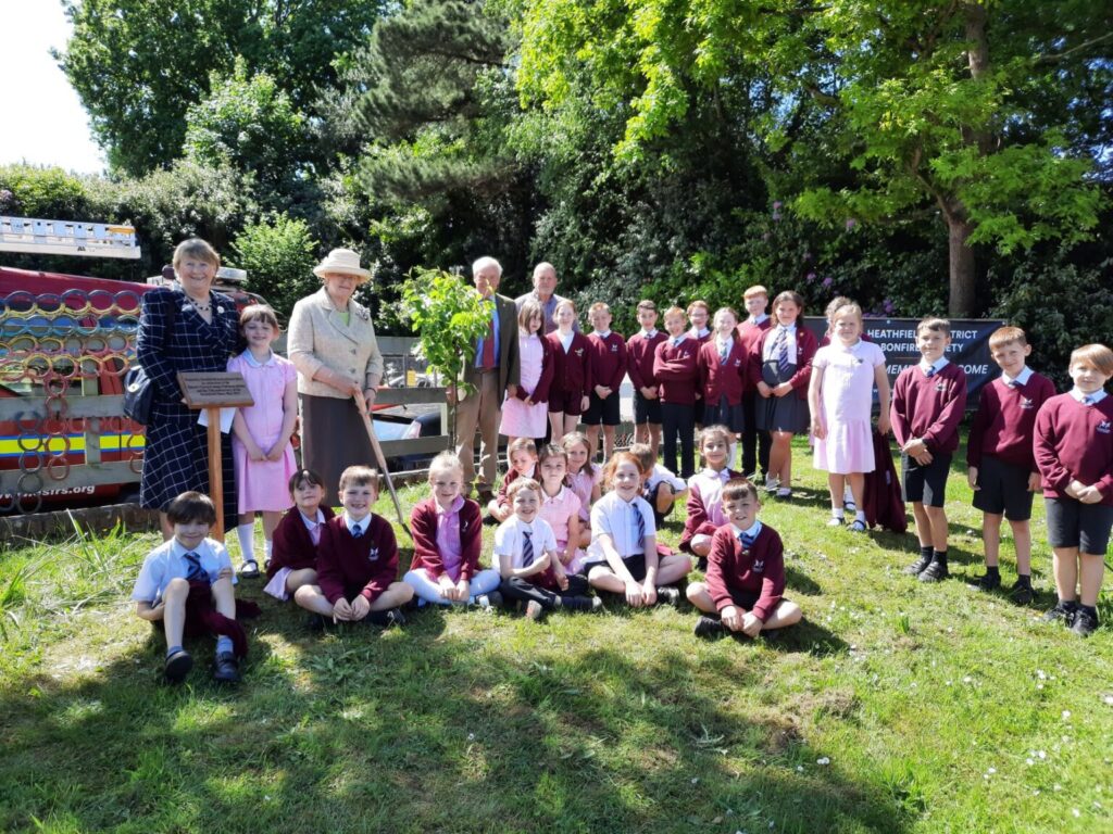 Tree planting ceremony at Heathfield Fire Station with children from the local Cross in Hand School