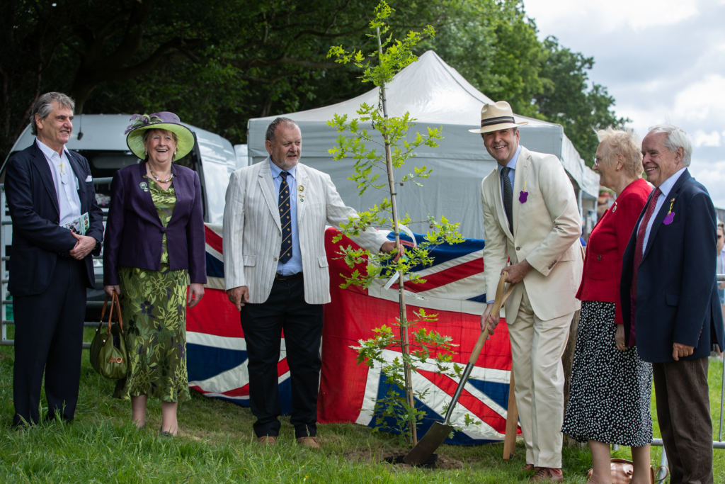 The Lord-Lieutenant planting an oak and launching the QGC in the county